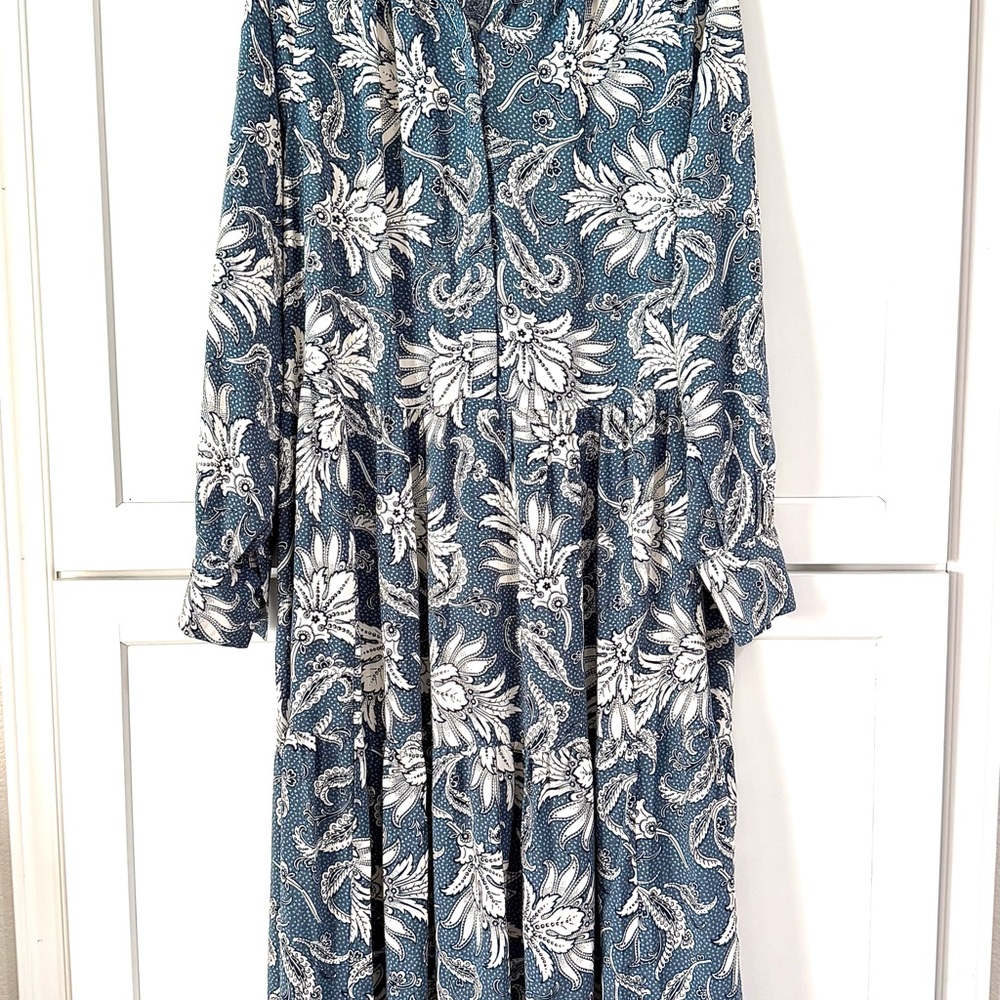 Floral Blue and White Dress with button cuffed sleeves and gathered wide hem.